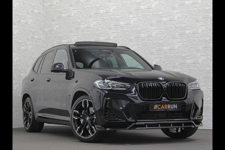 BMW iX3 M-Sport 80 kWh | Panorama | Leder | 99% SOH | ACC | Trekhaak | Memory | Camera | 3-Zone Clima | Carplay | Getint Glas | Black-Optic | Stoelverwarming | Draadloos Laden | Bovag Garantie |