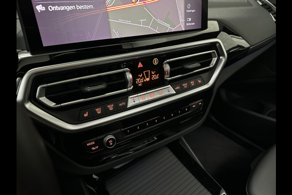 BMW iX3 M-Sport 80 kWh | Panorama | Leder | 99% SOH | ACC | Trekhaak | Memory | Camera | 3-Zone Clima | Carplay | Getint Glas | Black-Optic | Stoelverwarming | Draadloos Laden | Bovag Garantie |