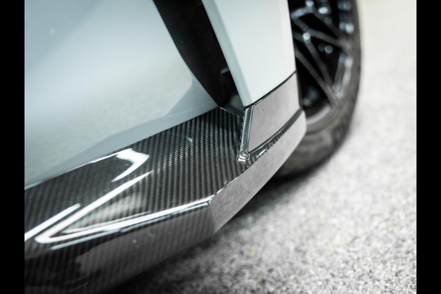 BMW 4 Serie Cabrio M4 xDrive Competition | Carbon Performance Pack | Yellow DRL'S | Brooklyn Grau | Stuurverwarming en nek verwarming |