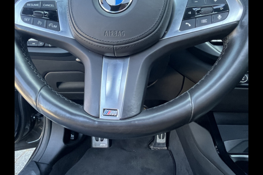 BMW 1-serie M135i xDrive High Executive M Sport 306pk Automaat | Panodak | Elektr. achterklep | Parking Pakket | Spiegel Pakket | Draadloze telefoonlader | etc. etc.