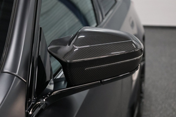 BMW 5 Serie Touring M5 950+PK BTW/AKRAPOVIC OPF DELETED/CARBON M-PERFORMANCE/EVENTURI/22” VOSSEN/B&W/PANO/HUD/12 MND GARANTIE!