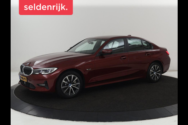 BMW 3-serie 330e Business Edition Plus | Sportstoelen | Leder | Adaptive cruise | Stoelverwarming | Carplay | Stuurverwarming | Navigatie | Parkeerhulp | Full LED | Live Cockpit | Individual Aventurinrot metallic | PHEV | Plug In