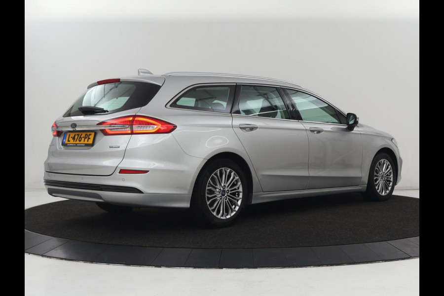 Ford Mondeo 2.0 IVCT HEV Titanium | Stoelverwarming | Carplay | Keyless | Navigatie | Verwarmde voorruit | Parkeerhulp | DAB | Climate control | Cruise control