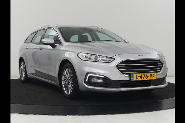 Ford Mondeo 2.0 IVCT HEV Titanium | Stoelverwarming | Carplay | Keyless | Navigatie | Verwarmde voorruit | Parkeerhulp | DAB | Climate control | Cruise control