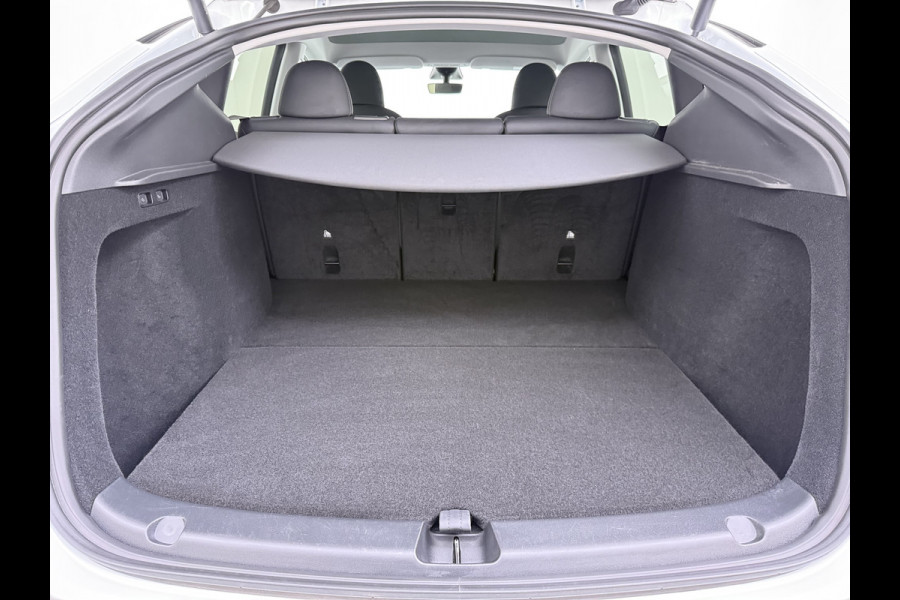 Tesla Model Y RWD 300pk SOH 95% Warmtepomp LFP-Accu Leer Lmv Camera's Panoramadak Adap.Cruise Navi Ecc Autopilot Stoel+Stuur+Achterbank Verwarming Elek.Achterklep Dodehoek detector Draadloze telefoonlader 1e Eigenaar Origineel Nederlandse Auto Fabrieksgarantie op Motor en Accu tot 08-03-2032/160.000km