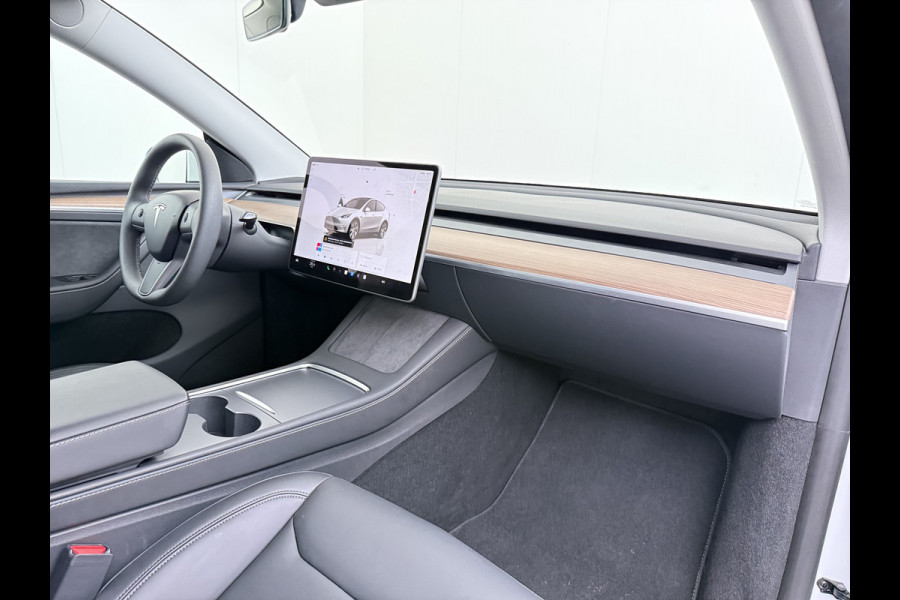 Tesla Model Y RWD 300pk SOH 95% Warmtepomp LFP-Accu Leer Lmv Camera's Panoramadak Adap.Cruise Navi Ecc Autopilot Stoel+Stuur+Achterbank Verwarming Elek.Achterklep Dodehoek detector Draadloze telefoonlader 1e Eigenaar Origineel Nederlandse Auto Fabrieksgarantie op Motor en Accu tot 08-03-2032/160.000km