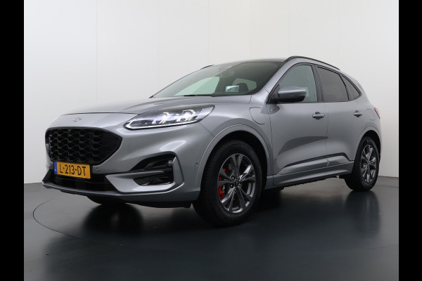 Ford Kuga 2.5 Hybrid PHEV ST-Line X Trekhaak Leer/Alcantara Head-Up Display Adaptive-Cruise Camera Navi Ecc Stoel+Achterbankverwarming App Privacy Glas Winterpakket Elek.Achterklep Led Virtual Cockpit Dodehoek-assistent 1.500KG Trekgewicht 1e Eigenaar Dealeronderhouden € 46.000 nieuw