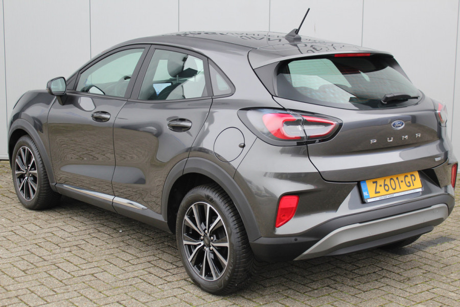 Ford Puma 1.0-125pk EcoBoost Mild-Hybrid Titanium. Fabrieksgarantie t/m 21-05-2027 ! Slechts 14.800km ! Volautm. airco, pdc achter, all season banden, stoel-, stuur- en voorraamverw., navigatie, telefoonvoorb., elektr. achterklep, cruise cntrl, keyless entry&go etc.