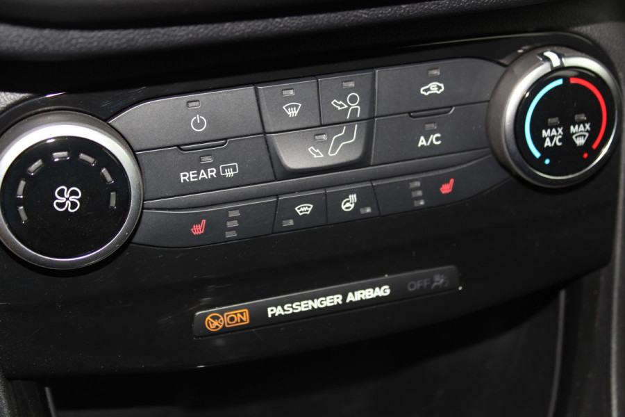 Ford Puma 1.0-125pk EcoBoost Mild-Hybrid Titanium. Fabrieksgarantie t/m 21-05-2027 ! Slechts 14.800km ! Volautm. airco, pdc achter, all season banden, stoel-, stuur- en voorraamverw., navigatie, telefoonvoorb., elektr. achterklep, cruise cntrl, keyless entry&go etc.