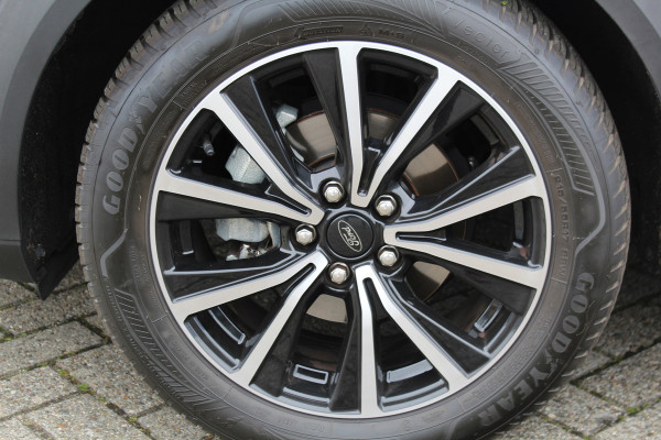 Ford Puma 1.0-125pk EcoBoost Mild-Hybrid Titanium. Fabrieksgarantie t/m 21-05-2027 ! Slechts 14.800km ! Volautm. airco, pdc achter, all season banden, stoel-, stuur- en voorraamverw., navigatie, telefoonvoorb., elektr. achterklep, cruise cntrl, keyless entry&go etc.