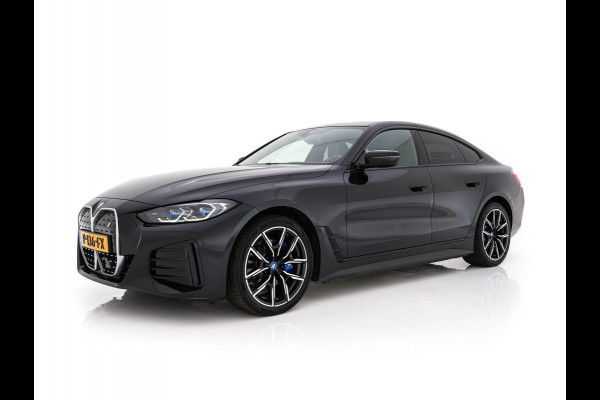BMW i4 eDrive40 High Executive 84 kWh M-Sportpack [ 3-Fase-11kW ] {SOH-93%} (INCL.BTW)  Aut *LEATHER | HEAD UP | FULL-LED | HIFI-SOUND | CRUISE | WIDESCREEN-COCKPIT | DAB+ | CAMERA | AMBIENTLIGHT | CARPLAY | HEATED-SPORTSEATS | PRIVACY-GLASS | 19''ALU*