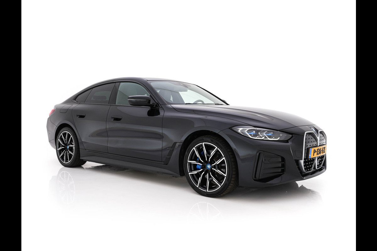 BMW i4 eDrive40 High Executive 84 kWh M-Sportpack [ 3-Fase-11kW ] {SOH-93%} (INCL.BTW)  Aut *LEATHER | HEAD UP | FULL-LED | HIFI-SOUND | CRUISE | WIDESCREEN-COCKPIT | DAB+ | CAMERA | AMBIENTLIGHT | CARPLAY | HEATED-SPORTSEATS | PRIVACY-GLASS | 19''ALU*