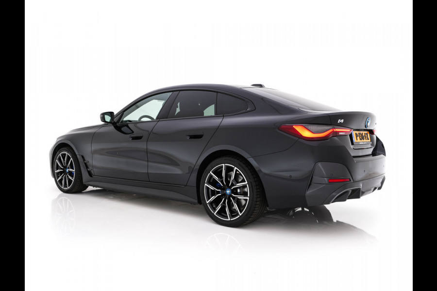 BMW i4 eDrive40 High Executive 84 kWh M-Sportpack [ 3-Fase-11kW ] {SOH-93%} (INCL.BTW)  Aut *LEATHER | HEAD UP | FULL-LED | HIFI-SOUND | CRUISE | WIDESCREEN-COCKPIT | DAB+ | CAMERA | AMBIENTLIGHT | CARPLAY | HEATED-SPORTSEATS | PRIVACY-GLASS | 19''ALU*