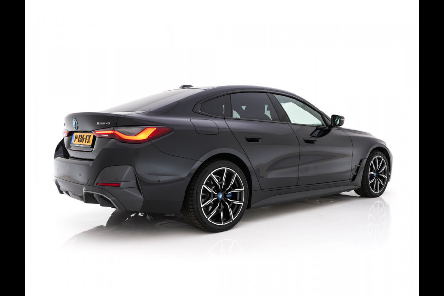BMW i4 eDrive40 High Executive 84 kWh M-Sportpack [ 3-Fase-11kW ] {SOH-93%} (INCL.BTW)  Aut *LEATHER | HEAD UP | FULL-LED | HIFI-SOUND | CRUISE | WIDESCREEN-COCKPIT | DAB+ | CAMERA | AMBIENTLIGHT | CARPLAY | HEATED-SPORTSEATS | PRIVACY-GLASS | 19''ALU*