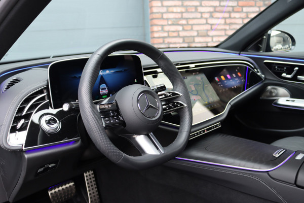 Mercedes-Benz E-Klasse 400 e 4MATIC AMG Line | Hyperscreen | Luchtvering | Achterasbesturing | Distronic+ | HUD | Massage | Burmester | Nappa Leder | Trekhaak | Vlakkenverwarming | Stoelventilatie | Soft-Close |