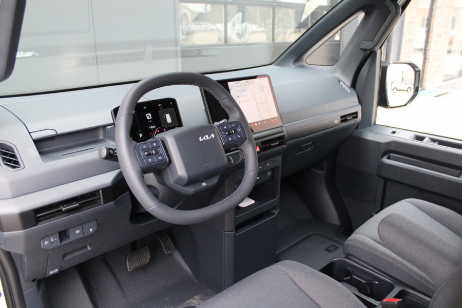 Kia PV5 L2H1 Essential 71.2 kWh 164pk - Stoel/Stuurverwarming - Keyless - V2L - Camera - ACC met stuurhulp - Rijklaar