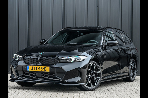 BMW 3 Serie Touring 330e xDrive M sport Accu 19,5kWh | Trekhaak | Panorama dak | Active Cruise  | Camera  | Ambiance interieur