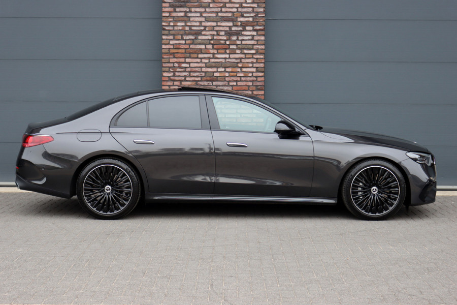 Mercedes-Benz E-Klasse 400 e 4MATIC AMG Line | Hyperscreen | Luchtvering | Achterasbesturing | Distronic+ | HUD | Massage | Burmester | Nappa Leder | Trekhaak | Vlakkenverwarming | Stoelventilatie | Soft-Close |