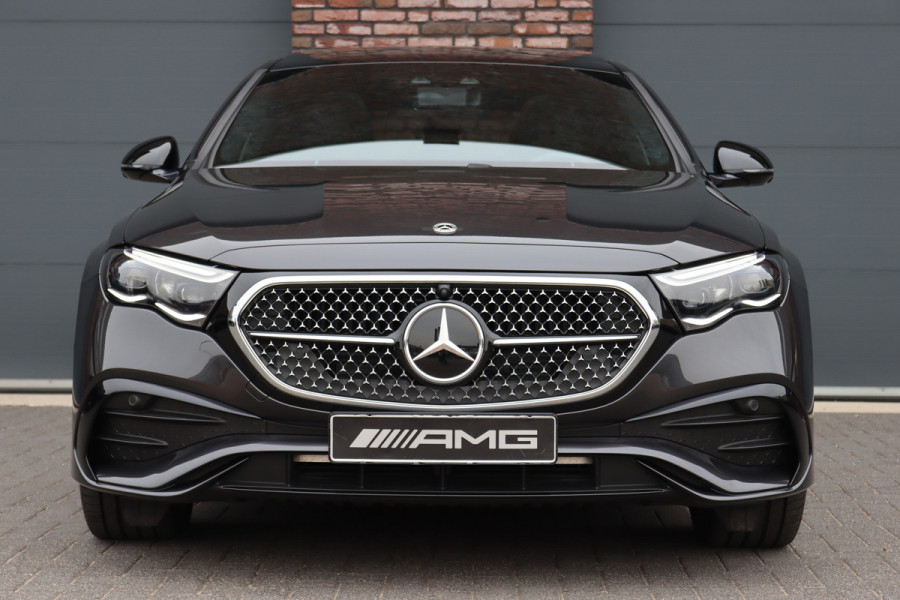 Mercedes-Benz E-Klasse 400 e 4MATIC AMG Line | Hyperscreen | Luchtvering | Achterasbesturing | Distronic+ | HUD | Massage | Burmester | Nappa Leder | Trekhaak | Vlakkenverwarming | Stoelventilatie | Soft-Close |