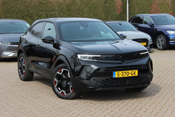 Opel Mokka-e GS Line 50-kWh / Camera / Leder / CarPlay / 18'' / Sfeerverlichting / Keyless / Stoelverwarming / Dodehoek / DAB / Cruise Control / Warmtepomp