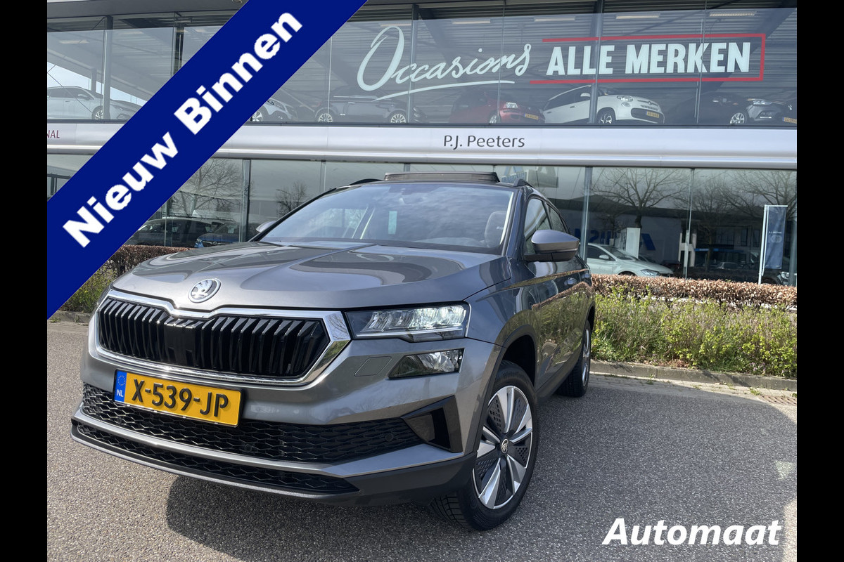 Škoda Karoq 1.5 TSI ACT Business Edition Plus Schuif/kanteldak - Achteruitrijcamera - Elektrische trekhaak stuurverwarming- Stoelverwarming - Parkeersensoren - Airco - Apple carplay - Navigatiesysteem - Achterspoiler - Stuur multifunctio Licht metalen velgen 17 inch - Bluetooth - Cruise control - Dakrails - Extra getint glas - Keyless entry/start - Led verlichting - Start/stop systeem - Elektrische ramen - Led verlichting