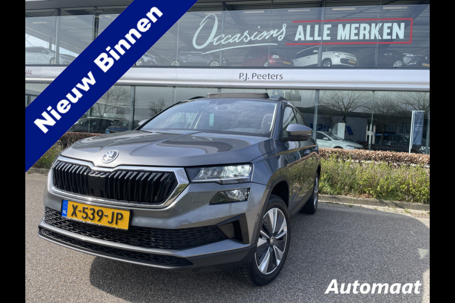 Škoda Karoq 1.5 TSI ACT Business Edition Plus Schuif/kanteldak - Achteruitrijcamera - Elektrische trekhaak stuurverwarming- Stoelverwarming - Parkeersensoren - Airco - Apple carplay - Navigatiesysteem - Achterspoiler - Stuur multifunctio Licht metalen velgen 17 inch - Bluetooth - Cruise control - Dakrails - Extra getint glas - Keyless entry/start - Led verlichting - Start/stop systeem - Elektrische ramen - Led verlichting