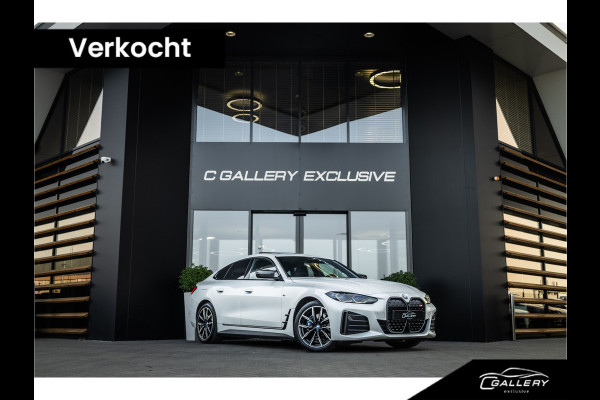 BMW i4 M50 High Executive 84 kWh - M Sport | Panorama | Carbon | 360 Camera | Sportstoelen