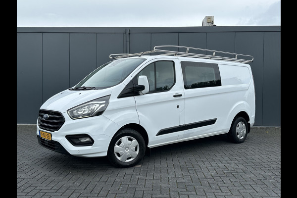 Ford Transit Custom 2.0 TDCI / L2H1 / DUBBEL CABINE / 1e EIG. / TREKHAAK / IMPERIAAL / CAMERA / CRUISE / 6 PERSOONS