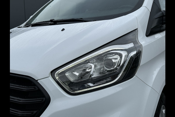 Ford Transit Custom 2.0 TDCI / L2H1 / DUBBEL CABINE / 1e EIG. / TREKHAAK / IMPERIAAL / CAMERA / CRUISE / 6 PERSOONS