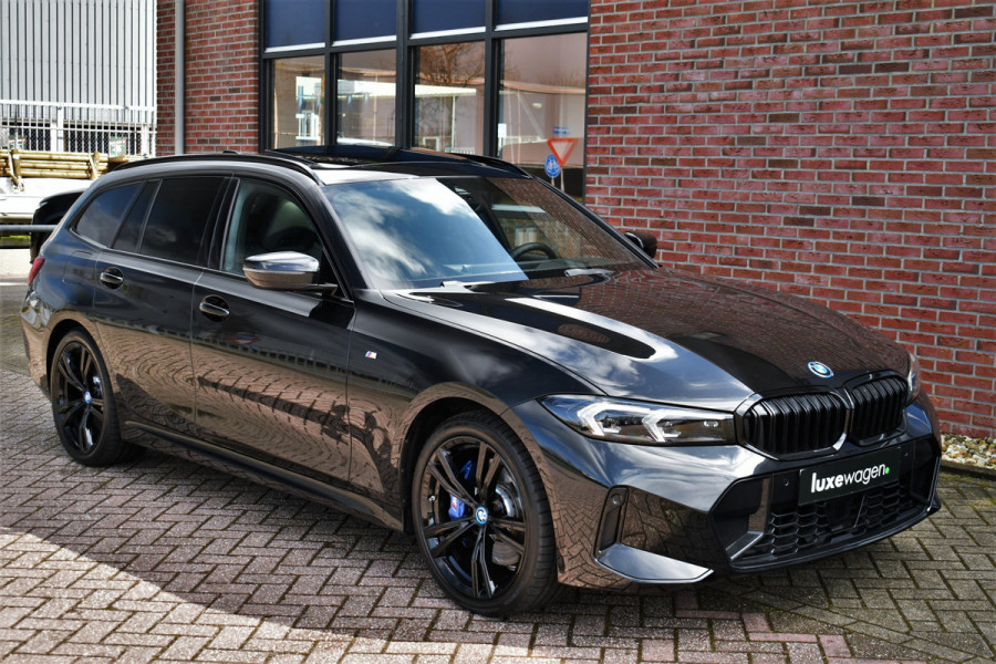 BMW 3 Serie Touring 330e M-Sport Pro Pano M-zetels ACC HUD HiFi 19inch