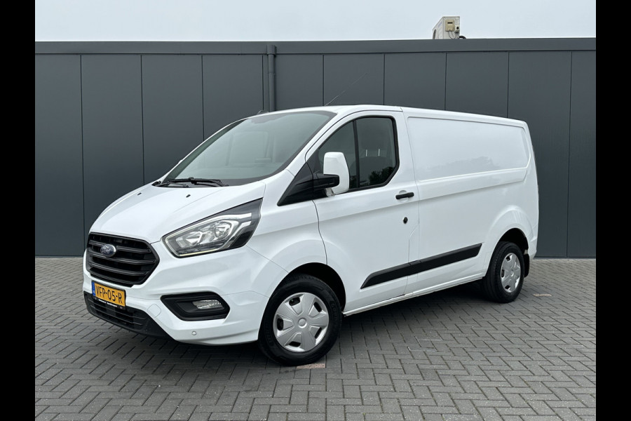 Ford Transit Custom 2.0 TDCI / L1H1 / 1e EIG. / 2.500 KG AHG / CAMERA / TREKHAAK / CRUISE / AIRCO / NAVI / STOELVERW.