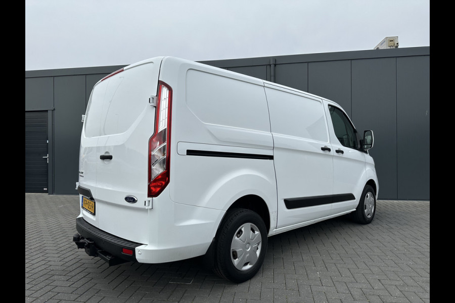 Ford Transit Custom 2.0 TDCI / L1H1 / 1e EIG. / 2.500 KG AHG / CAMERA / TREKHAAK / CRUISE / AIRCO / NAVI / STOELVERW.