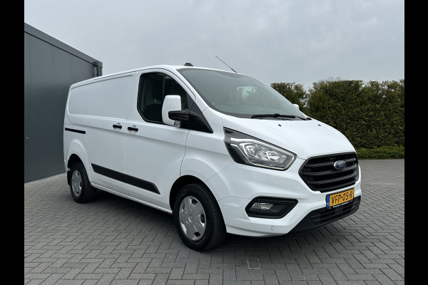 Ford Transit Custom 2.0 TDCI / L1H1 / 1e EIG. / 2.500 KG AHG / CAMERA / TREKHAAK / CRUISE / AIRCO / NAVI / STOELVERW.