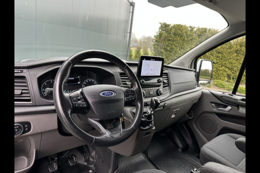 Ford Transit Custom 2.0 TDCI / L1H1 / 1e EIG. / 2.500 KG AHG / CAMERA / TREKHAAK / CRUISE / AIRCO / NAVI / STOELVERW.
