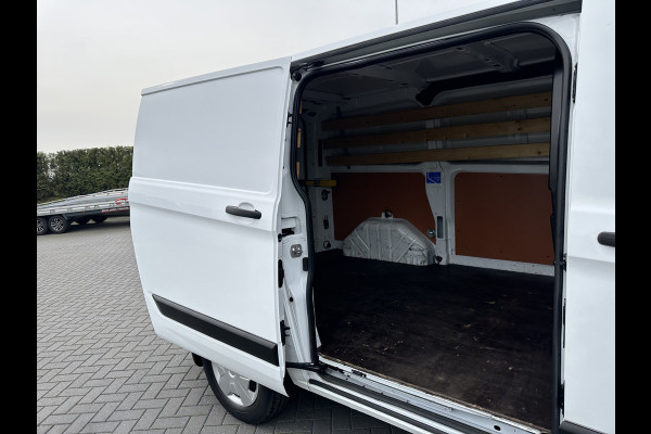 Ford Transit Custom 2.0 TDCI / L1H1 / 1e EIG. / 2.500 KG AHG / CAMERA / TREKHAAK / CRUISE / AIRCO / NAVI / STOELVERW.