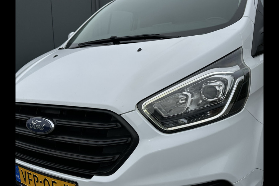 Ford Transit Custom 2.0 TDCI / L1H1 / 1e EIG. / 2.500 KG AHG / CAMERA / TREKHAAK / CRUISE / AIRCO / NAVI / STOELVERW.