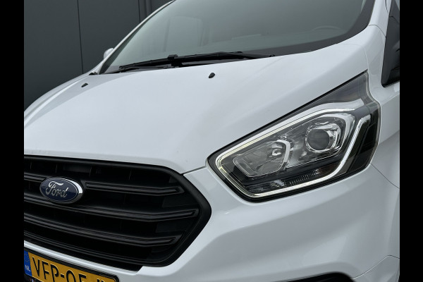 Ford Transit Custom 2.0 TDCI / L1H1 / 1e EIG. / 2.500 KG AHG / CAMERA / TREKHAAK / CRUISE / AIRCO / NAVI / STOELVERW.