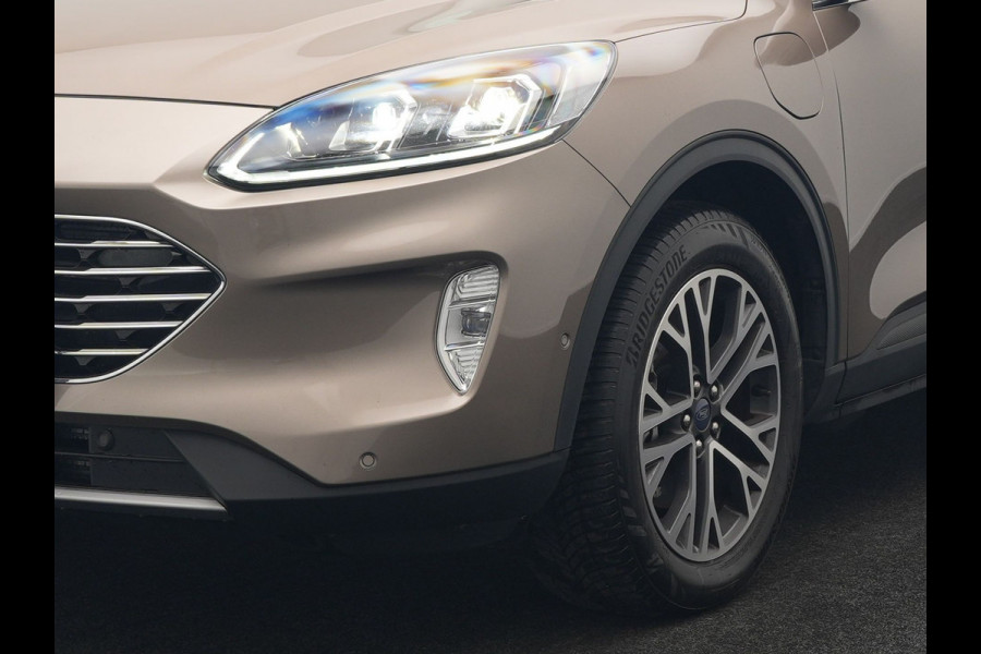Ford Kuga 2.5 Titanium X PHEV 225pk Dealer O.H. | Trekhaak Af Fabriek | Panodak | Head Up | Adaptive Cruise | 360 Camera | Bang & Olufsen | Sportstoelen & Stuur Verwarmd | Keyless | Blis | Navigatie | DAB | Plug In Hybrid |