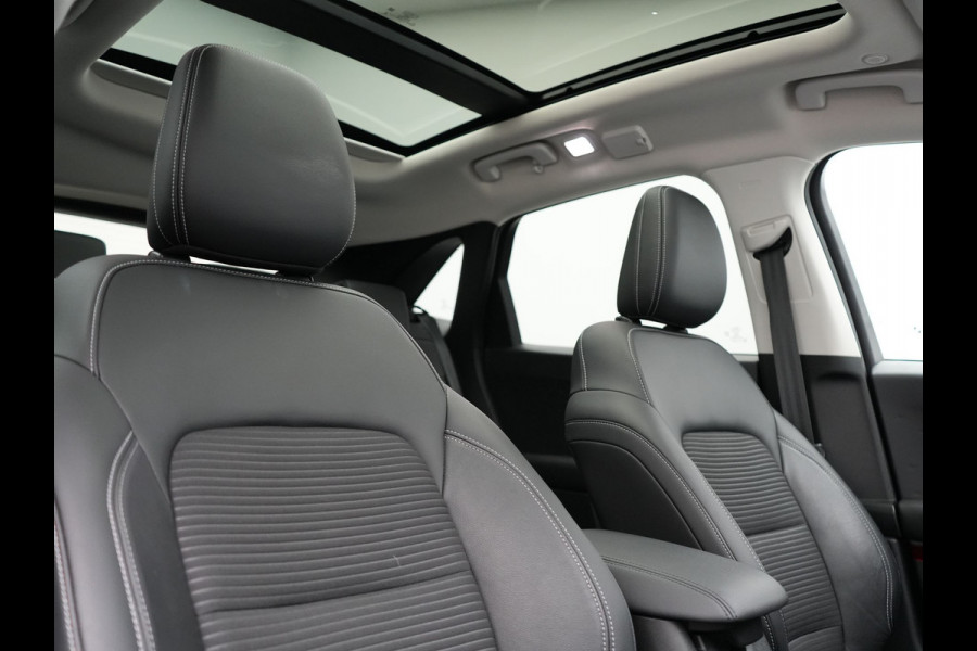 Ford Kuga 2.5 Titanium X PHEV 225pk Dealer O.H. | Trekhaak Af Fabriek | Panodak | Head Up | Adaptive Cruise | 360 Camera | Bang & Olufsen | Sportstoelen & Stuur Verwarmd | Keyless | Blis | Navigatie | DAB | Plug In Hybrid |