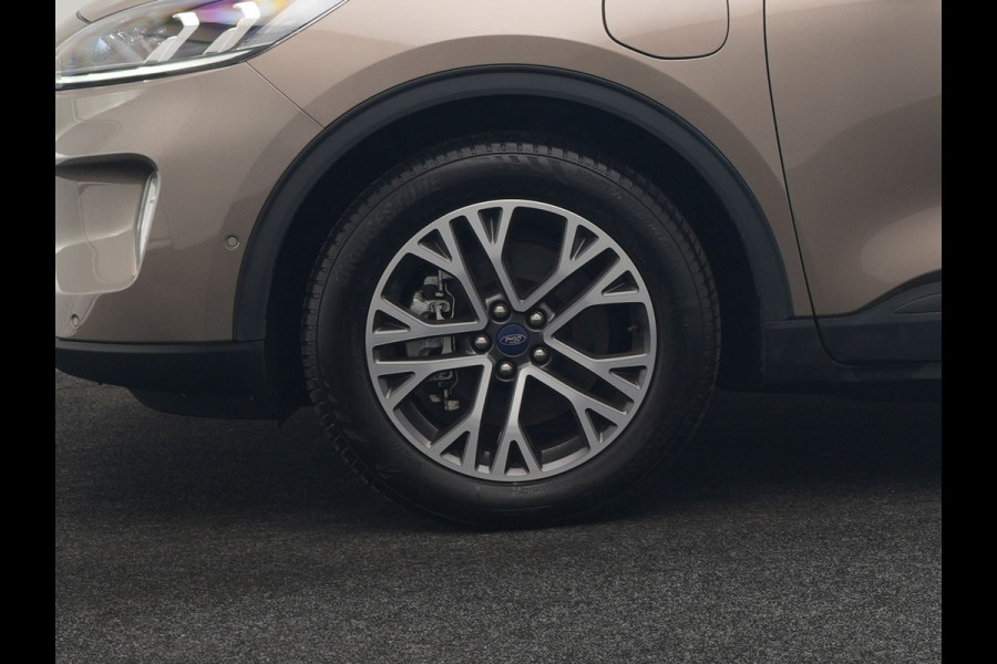 Ford Kuga 2.5 Titanium X PHEV 225pk Dealer O.H. | Trekhaak Af Fabriek | Panodak | Head Up | Adaptive Cruise | 360 Camera | Bang & Olufsen | Sportstoelen & Stuur Verwarmd | Keyless | Blis | Navigatie | DAB | Plug In Hybrid |