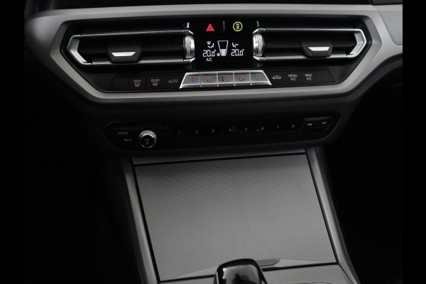BMW 3 Serie 318i Business Edition | Trekhaak | Sportstoelen | Half leder | Adaptief LED | Carplay | Navigatie | Parkeerhulp | Climate control | Bluetooth | Cruise control