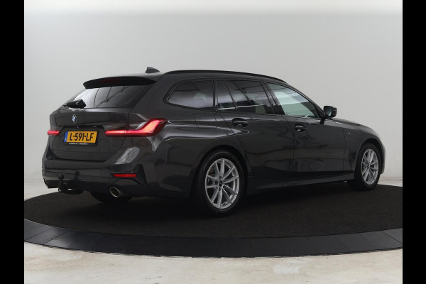 BMW 3 Serie 318i Business Edition | Trekhaak | Sportstoelen | Half leder | Adaptief LED | Carplay | Navigatie | Parkeerhulp | Climate control | Bluetooth | Cruise control