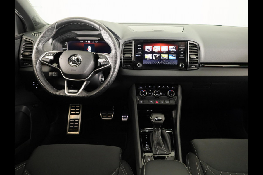 Škoda Karoq 1.5 TSI ACT Sportline Business 150pk | Wegklapbare trekhaak | Navigatie via APP | Verlengde garantie | Verwambare stoelen voor en achter