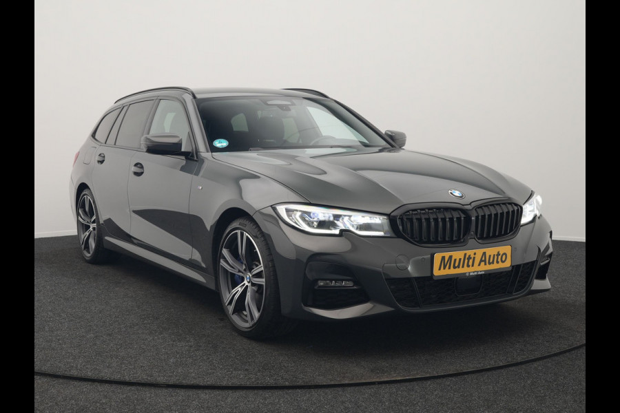BMW 3 Serie Touring 330e M Sport PHEV 293pk Dealer O.H. | Trekhaak Af Fabriek | Head Up | Adaptive Cruise | Laser LED | Harman / Kardon | Camera | Adaptief Onderstel | Alcantara Sportstoelen Verwarmd | Keyless | Blis | Sfeerverlichting | Dravitgrau metallic | Plug In Hybrid