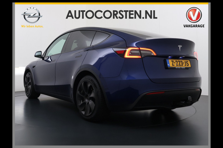Tesla Model Y RWD 300pk Trekhaak SOH 92% Warmtepomp LFP-Accu Leer Lmv Camera's Panoramadak Adap.Cruise Navi Ecc Autopilot Stoel+Stuur+Achterbank Verwarming Elek.Achterklep Dodehoek detector Draadloze telefoonlader 1e Eigenaar 1.600KG Trekgewicht Fabrieksgarantie op Motor en Accu tot 22-04-2032/160.000km