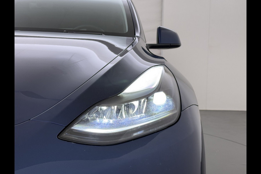 Tesla Model Y RWD 300pk Trekhaak SOH 92% Warmtepomp LFP-Accu Leer Lmv Camera's Panoramadak Adap.Cruise Navi Ecc Autopilot Stoel+Stuur+Achterbank Verwarming Elek.Achterklep Dodehoek detector Draadloze telefoonlader 1e Eigenaar 1.600KG Trekgewicht Fabrieksgarantie op Motor en Accu tot 22-04-2032/160.000km