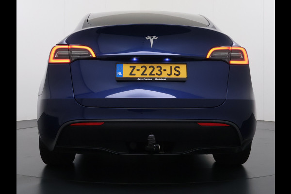 Tesla Model Y RWD 300pk Trekhaak SOH 92% Warmtepomp LFP-Accu Leer Lmv Camera's Panoramadak Adap.Cruise Navi Ecc Autopilot Stoel+Stuur+Achterbank Verwarming Elek.Achterklep Dodehoek detector Draadloze telefoonlader 1e Eigenaar 1.600KG Trekgewicht Fabrieksgarantie op Motor en Accu tot 22-04-2032/160.000km