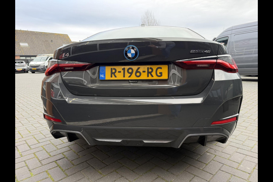 BMW i4 eDrive40 84 kWh | M-Pakket | Schuifdak | Dravitgrau metallic | NL-Auto |