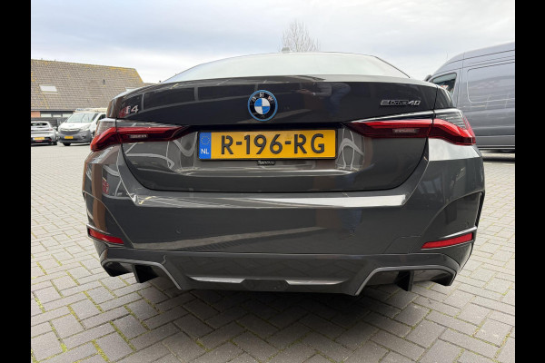 BMW i4 eDrive40 84 kWh | M-Pakket | Schuifdak | Dravitgrau metallic | NL-Auto |