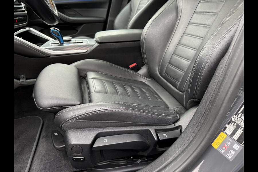 BMW i4 eDrive40 84 kWh | M-Pakket | Schuifdak | Dravitgrau metallic | NL-Auto |